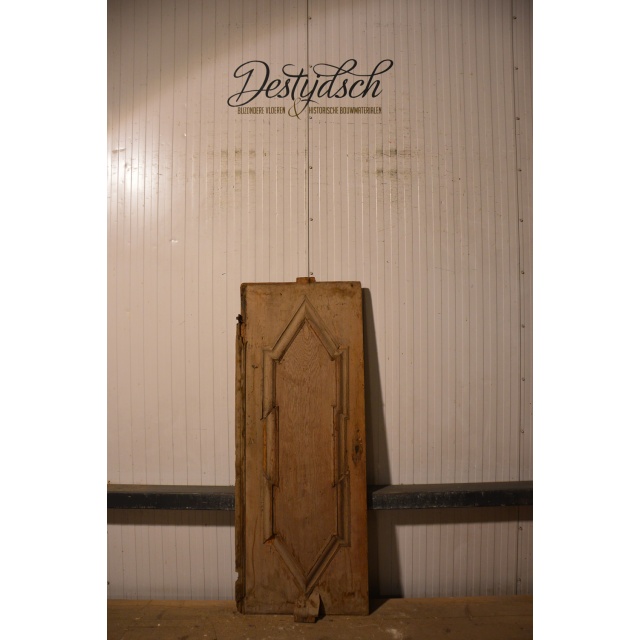 Oude geloogde kastdeur 