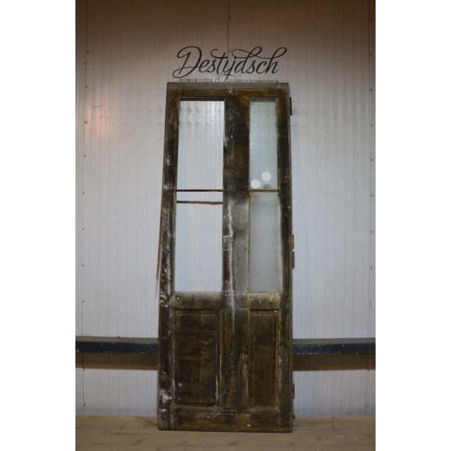 Oude geloogde opdekdeur      