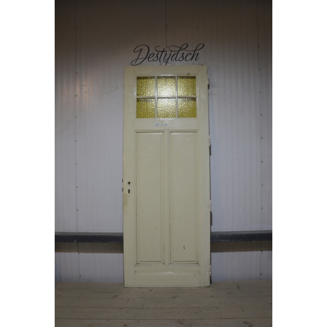 Oude paneeldeur met glas 