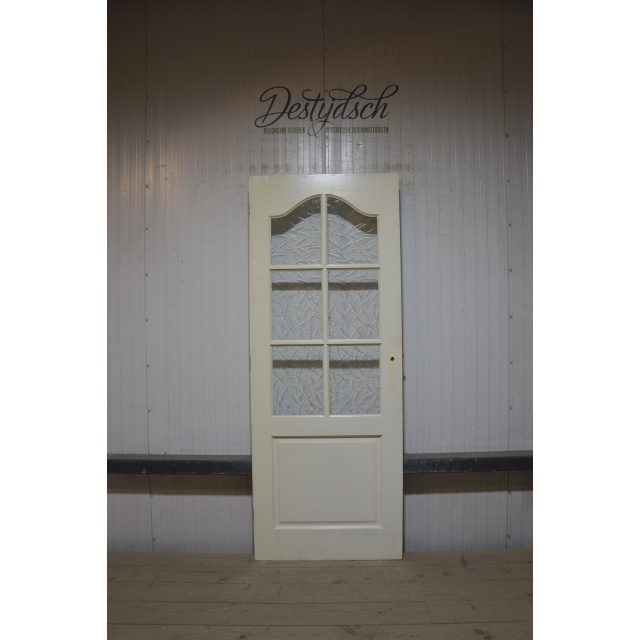 Oude paneeldeur met glas 