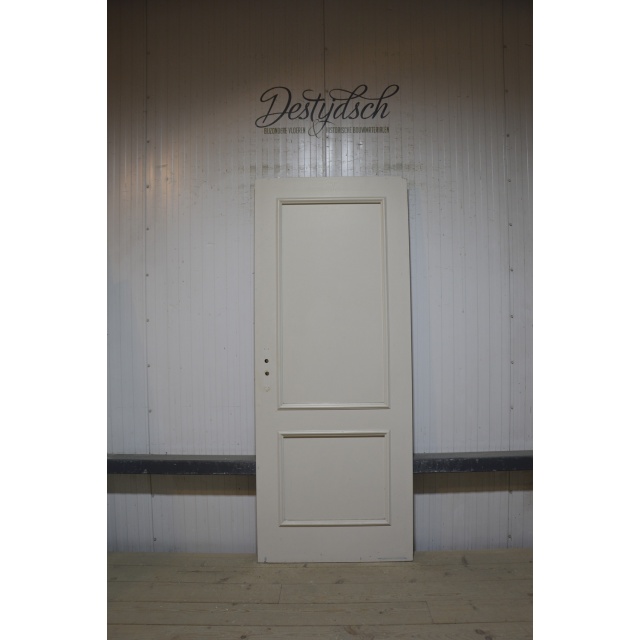 Oude tweevaks opdekpaneeldeur 