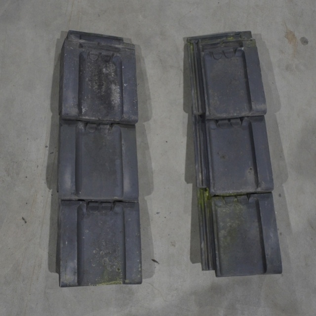 Partij tuile du nord gevelpannen met vlakke wel 